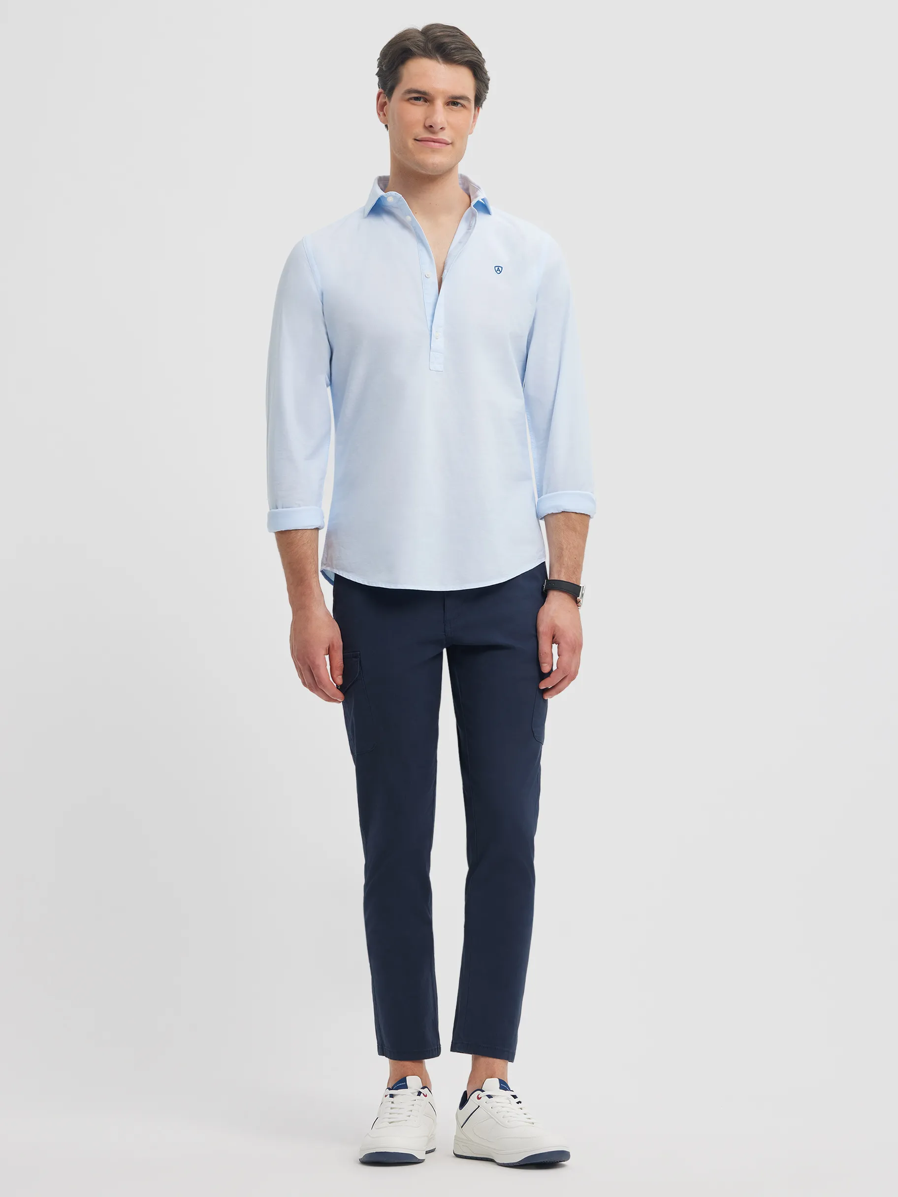 polera_pin_point_celeste_1.webp Store Alvaro Moreno POLERA PIN POINT Celeste